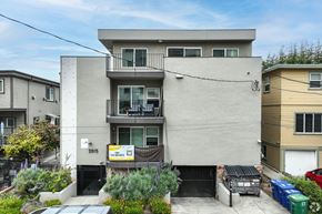 Berkeley apartment for rent - A modern two-story house with a balcony on the second floor.