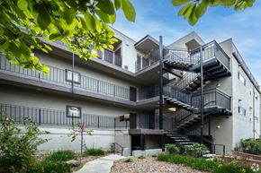 Berkeley apartment for rent - A modern building with a staircase and balconies.