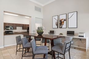 Houston apartment for rent - A dining room with a table and chairs.