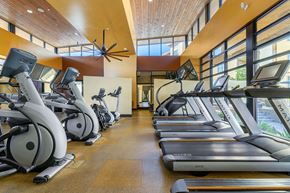 Phoenix apartment for rent - a gym with treadmills and ellipticals at the resort at governors crossing