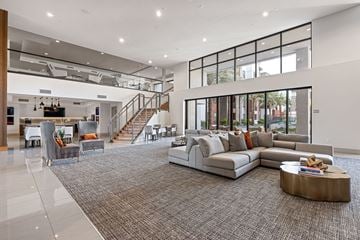 Chandler apartment for rent - a large living room with a couch and a table