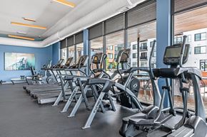 Aurora apartment for rent - A gym with treadmills and exercise equipment.