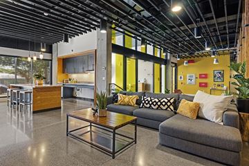 Seattle apartment for rent - a living room with a couch and a coffee table