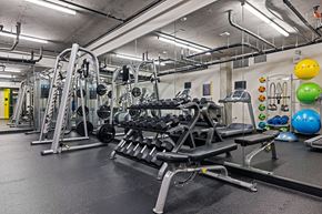 Seattle apartment for rent - a gym with weights and cardio equipment in a building