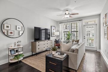 Atlanta apartment for rent - a living room with a couch and a tv