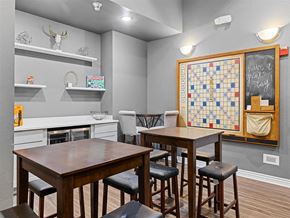 Broomfield apartment for rent - A dining room with a wooden table and chairs.