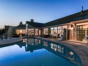 Castle Pines apartment for rent - A house with a pool in front of it.