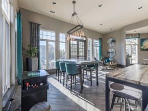 Castle Pines apartment for rent - A modern kitchen with a dining table and chairs.
