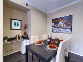 Lakewood apartment for rent - a dining room with a table and chairs