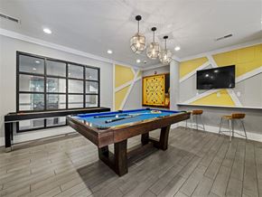 Atlanta apartment for rent - a game room with a pool table and a television