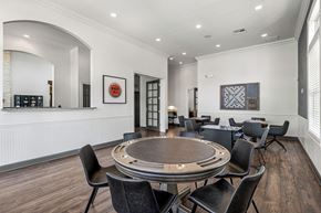 San Antonio apartment for rent - a conference room with a round table and chairs