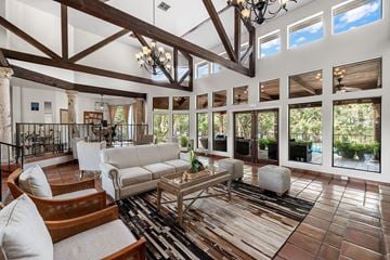 Austin apartment for rent - a living room with couches and chairs and a table