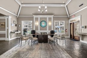 Houston apartment for rent - A dining room with a table set for six.