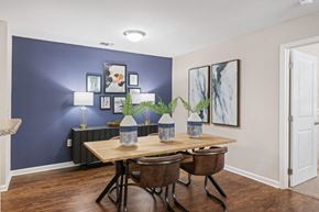 Morrisville apartment for rent - a dining room with a table and chairs