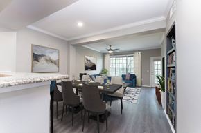 Houston apartment for rent - A dining room with a table set for six.