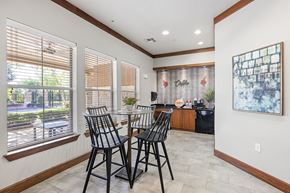 Spring apartment for rent - A dining room with a table and chairs.