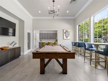 Charlotte apartment for rent - a pool table in the center of a living room