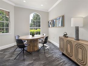 Charlotte apartment for rent - a dining room with a table and chairs and a lamp
