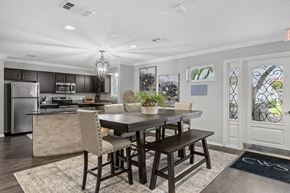 Flower Mound apartment for rent - a kitchen with a large island and a table with chairs