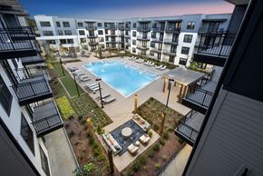Norcross apartment for rent - an overhead view of an apartment building with a swimming pool