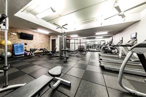 Austin apartment for rent - A gym with treadmills, weights, and exercise equipment.