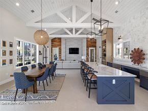 Austin apartment for rent - A modern dining room with a wooden table and chairs.