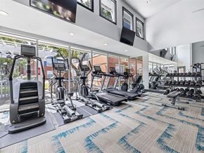 Dallas apartment for rent - A gym with treadmills, elliptical machines, and other exercise equipment.