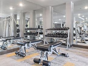Dallas apartment for rent - the gym at the condo is equipped with weights and cardio equipment
