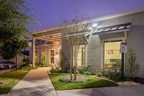 Austin apartment for rent - A building with a tree in front of it.