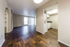 Austin apartment for rent - A room with wooden floors and a white ceiling.