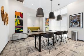 Westminster apartment for rent - a dining room with a long table and chairs