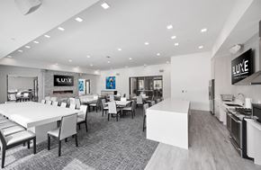 Minnetonka apartment for rent - a large dining room with tables and chairs and a kitchen