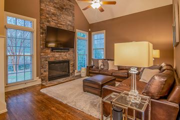 San Francisco apartment for rent - A living room with a fireplace and a couch.