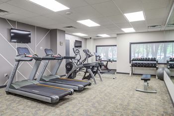 24/7 Fitness center with peloton, cardio & strength equipment