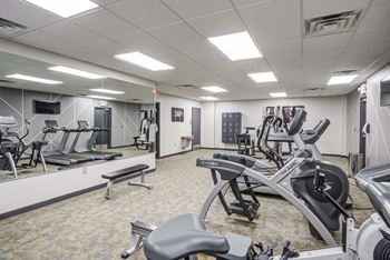 24/7 Fitness center with peloton, cardio & strength equipment