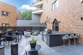 Outdoor lounge with grill & fire pit