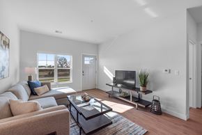 Plymouth apartment for rent - Living room area at The Landing at Hub City, WI, 53073