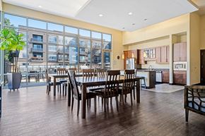 Wauwatosa apartment for rent - A large dining room with a view of apartment buildings outside the large windows.