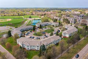 Plymouth townhouse for rent - aerial view of lakeview commons apartment complex with views of nearby athletic fields