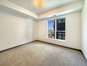 St. Paul apartment for rent - A room with a window and carpeted floor.