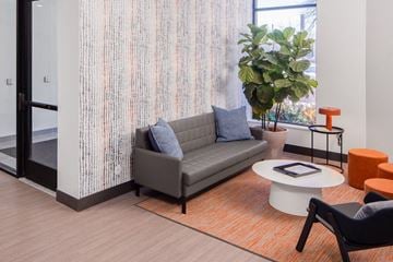 Minneapolis apartment for rent - a living room with a couch and a table