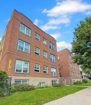 Minneapolis apartment for rent - A red brick building with the number 2333 on it.