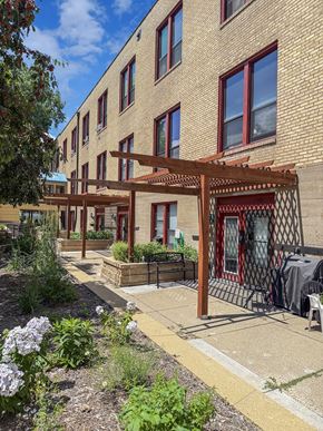 St. Paul apartment for rent - A building with a red and white striped awning.