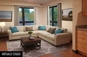 St. Paul apartment for rent - a living room with a couch and a coffee table