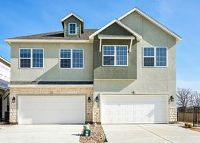 Red Oak townhouse for rent - A two-story house with a garage on the ground floor.