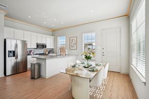 Red Oak townhouse for rent - A kitchen with a table set for a meal.