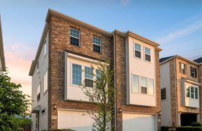 Montgomery townhouse for rent - A modern two-story house with a garage is shown.
