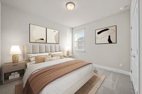 Kyle townhouse for rent - A bedroom with a large bed and two lamps on side tables.