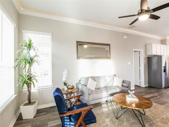 Denton apartment for rent - a living room with a couch and a table