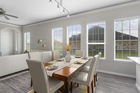 Rosharon townhouse for rent - A dining room with a table set for four.